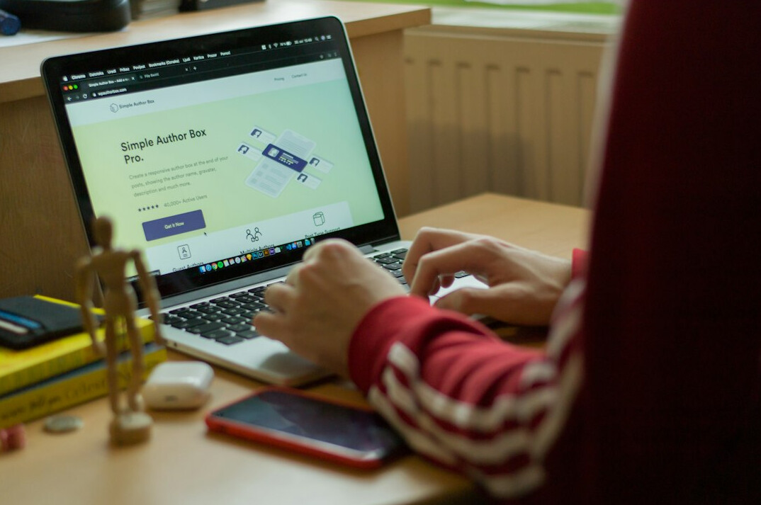 croatian student coding on laptop
